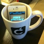 Of course the CocoaConf Mug gets used as an iPhone amplifier...